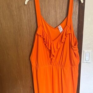 Woman’s orange long dress